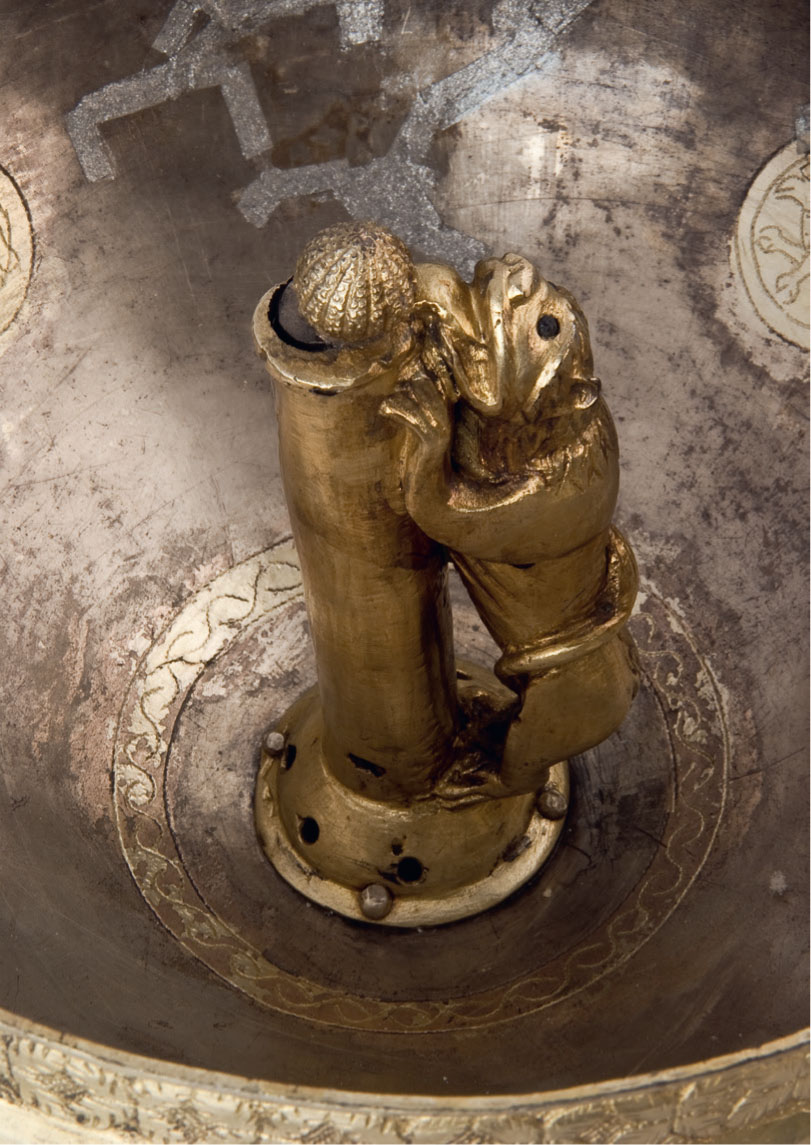 7 Lion and post from interior of covered cup