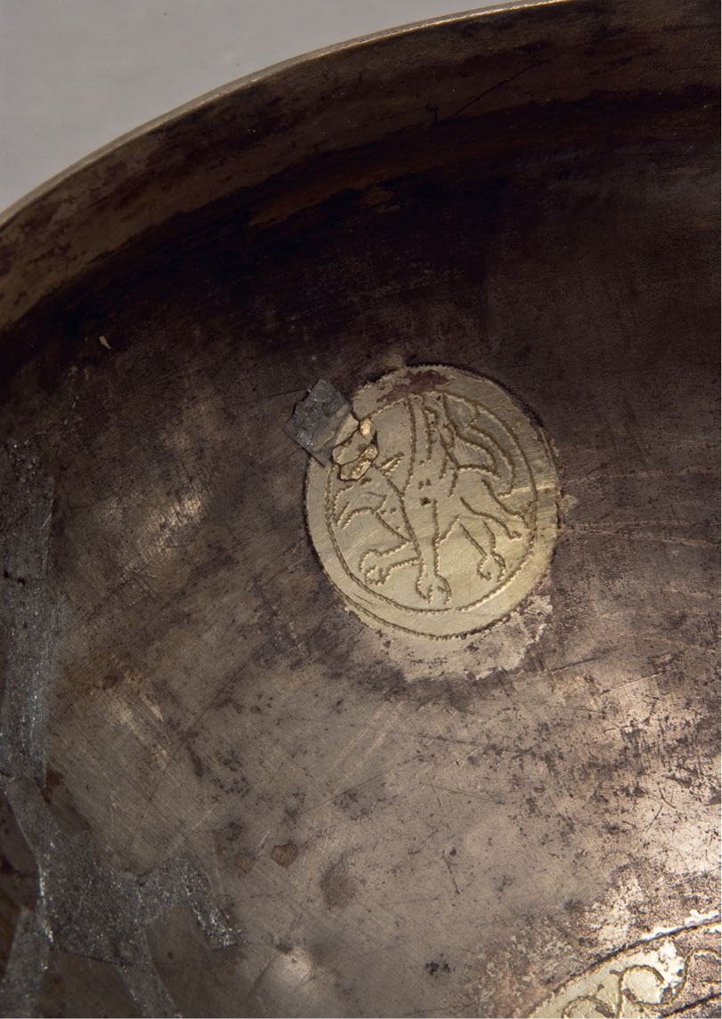 8 Engraved roundel with griffin on interior of covered cup
