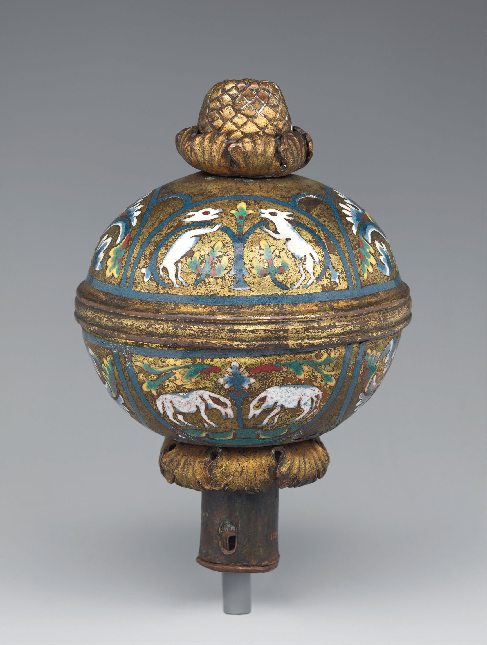 15 Spherical knop, late 12th century, gilded copper and champlevé enamel, 13.7 × 9.4 cm. New York, The Metropolitan Museum of Art