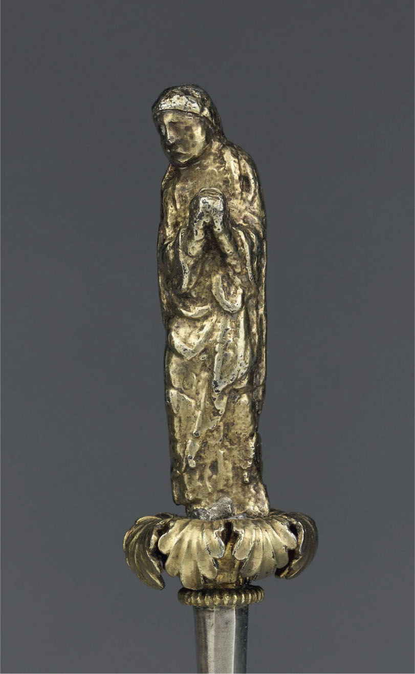 17 Figure of St. John on a base of leaves, detail of the True Cross reliquary of Abbot Hugh. Paris, Musée du Louvre