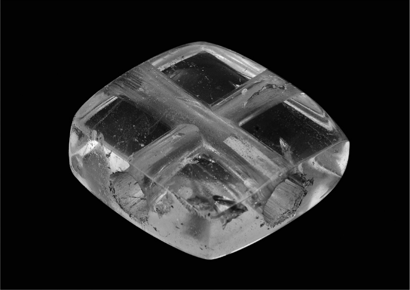 29 
Rock crystal tablet excavated from the Chungul Kurgan, late 12th century, rock crystal, 4.6 × 5.0 × 1.4 cm, diameter of perforations 1.1 cm. Kyiv, Treasury of the National Museum of History of Ukraine
