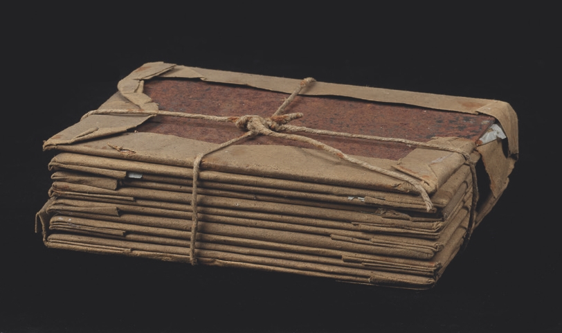 5 
Block of 12 steel plates wrapped in paper and tied with a cord, stamp on the verso of Hughes & Kimber, London, 10 × 13 cm. Oxford, Bodleian Libraries, MS WHF Talbot 86