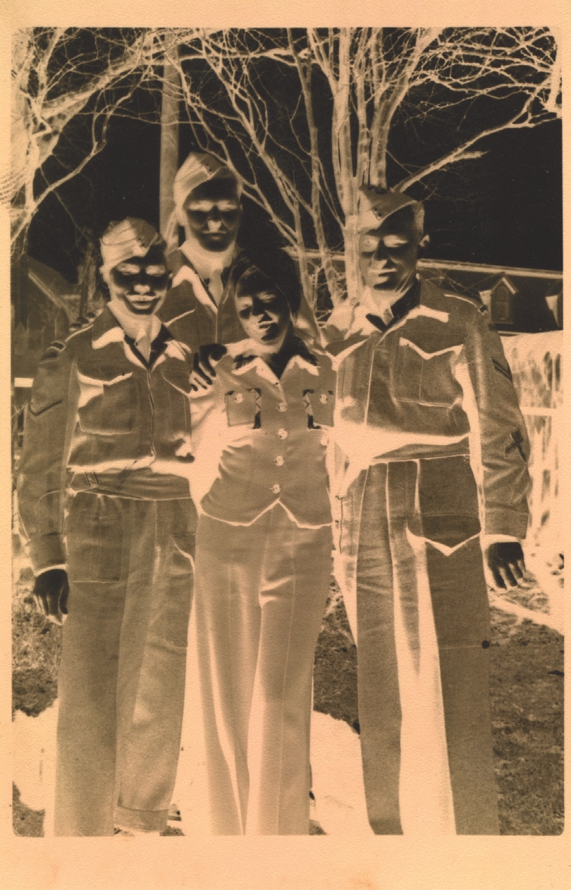 7 
Negative image of a woman and three Canadian servicemen, photographer unknown, c. 1940s. Author’s personal collection