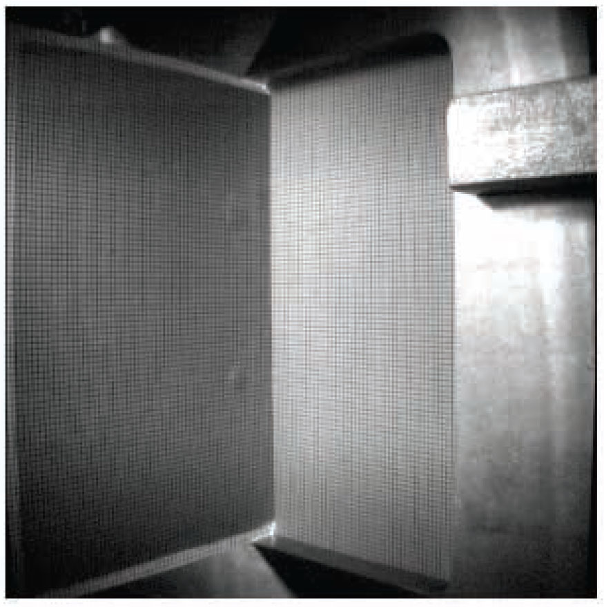 Figure 12 Photograph from the experimental test for the millimeter sheets fixed in frames.