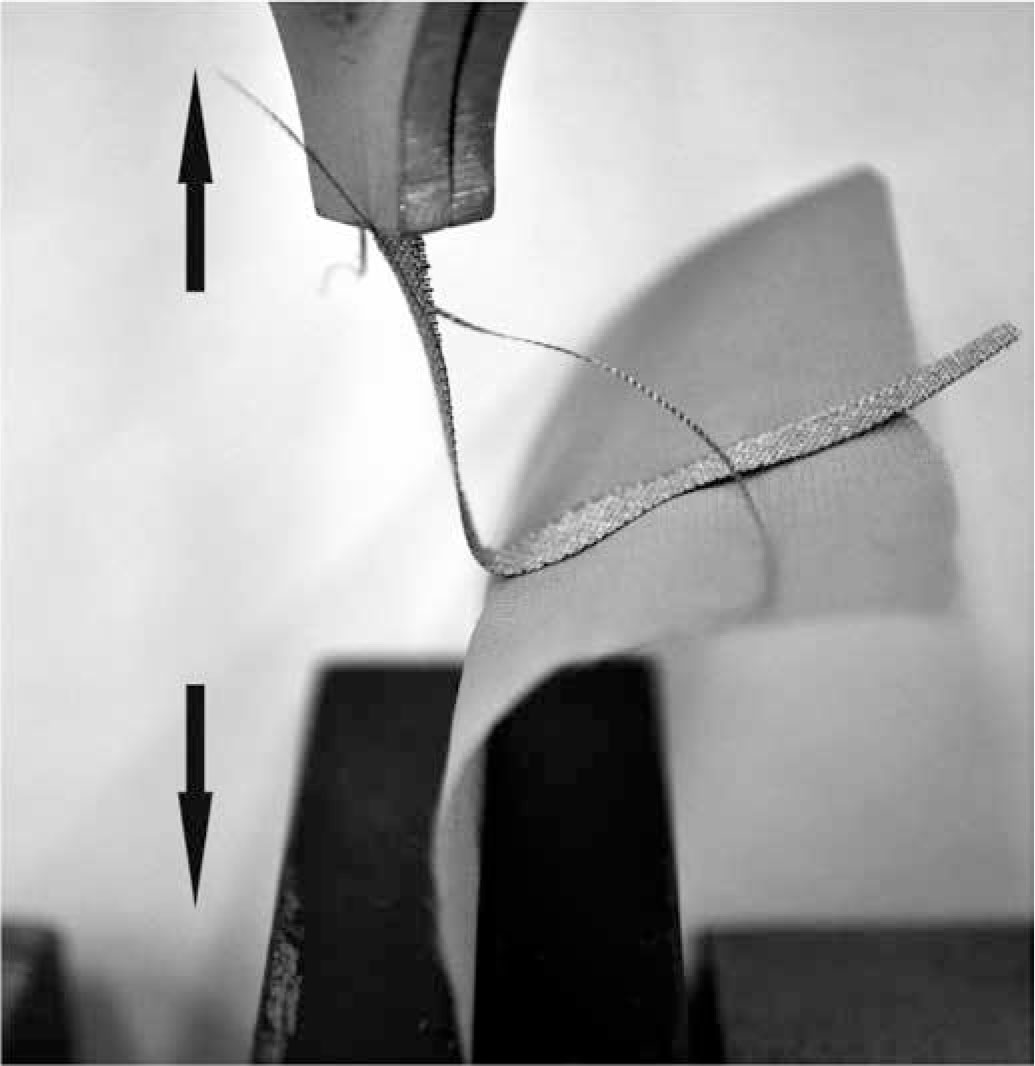 Figure 4 Bonding strength measurements using an Instron strength test machine.