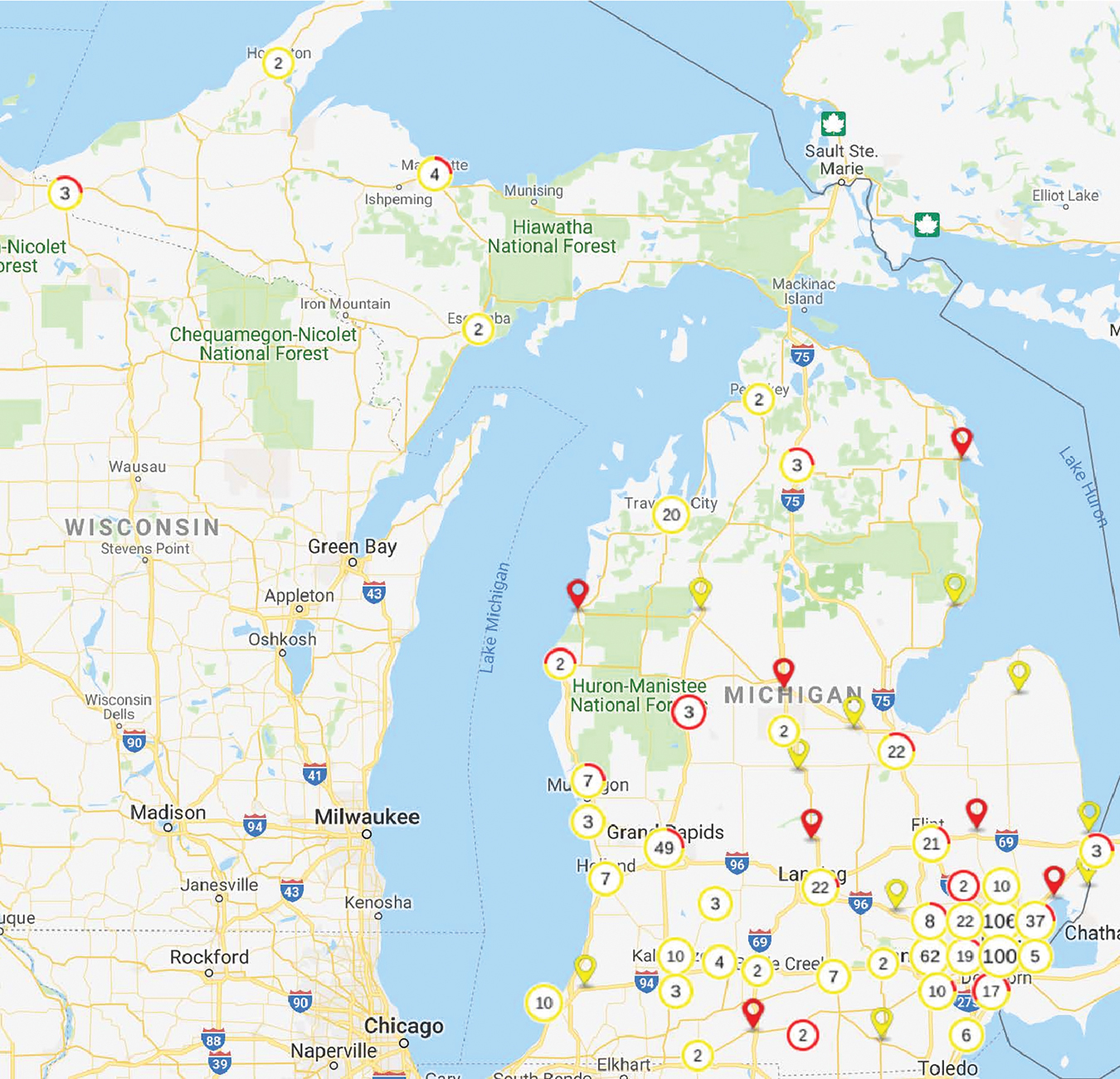 Figure 1. Illustration of geographic distribution of ophthalmologists in Michigan in 2018. Red represents osteopathic physicians and yellow represents allopathic physicians. The numbers inside the circles represent the total number of ophthalmologists in that community/location/area. The colored area along the diameter of the circles represents the proportion of osteopathic physicians or allopathic physicians. that community. No number inside these circles denotes that there is only 1 ophthalmologist in the community.
